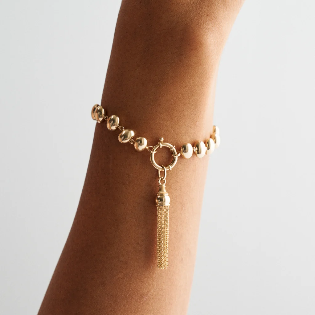 Golden Tassel Charm - Image 4